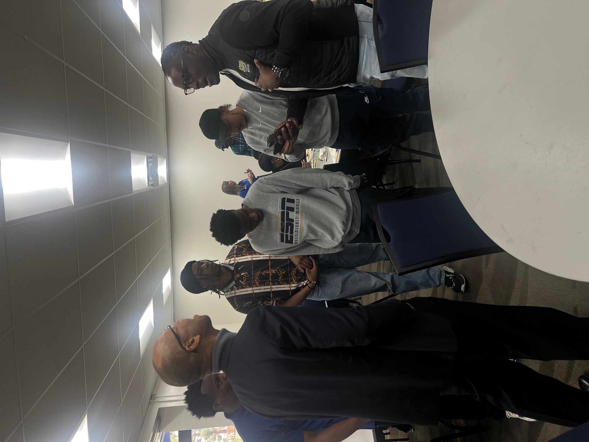 Group talking with pastor