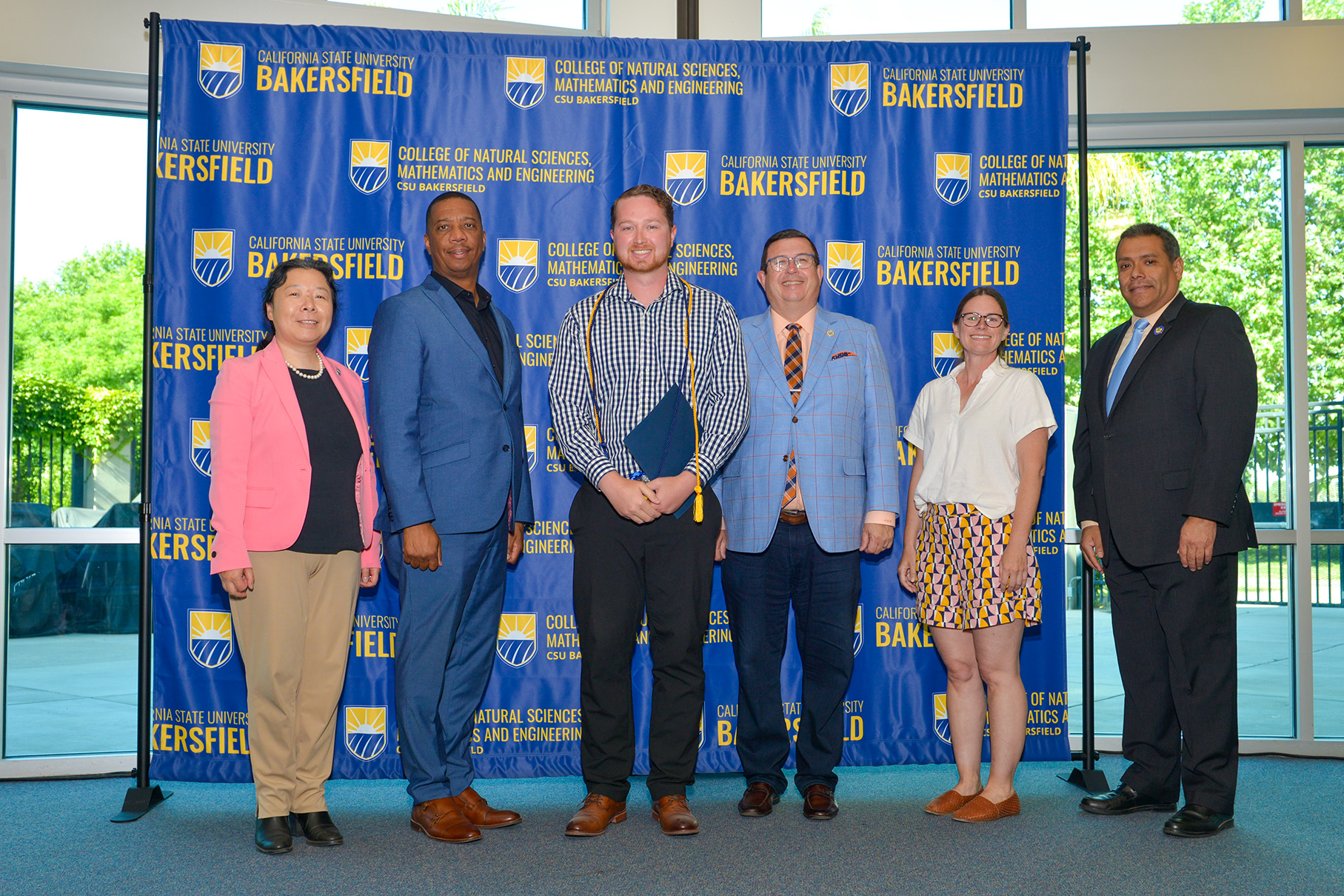 Braedon receiving his award