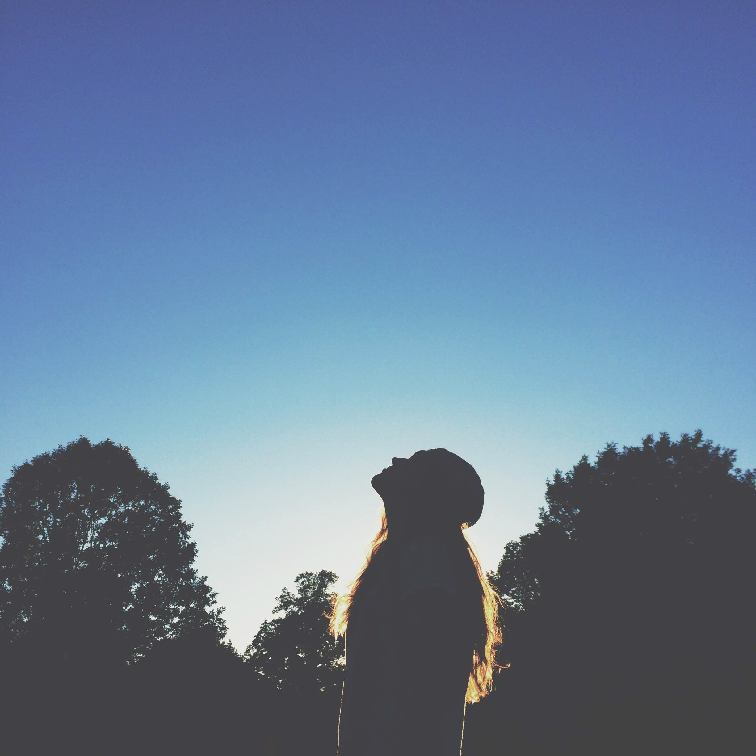 Woman looking at sky