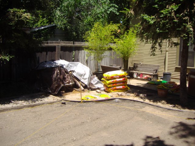 hereisthewoodconcretepilethatihadtoclearforthepergola.jpg